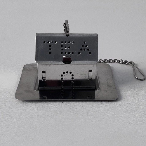 Vintage stainless steel tea infuser house with base and chain like new