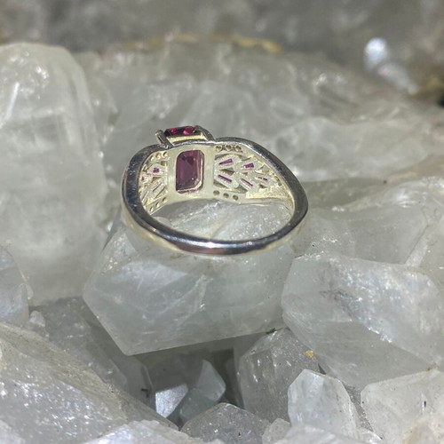 Silver ring with natural rhodolite garnet and moissanite
