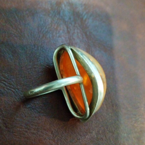 Silver women's ring with amber used