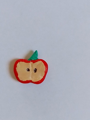 Handmade apple magnet from clay