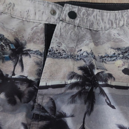 H&M men's swim shorts small used, multicolor