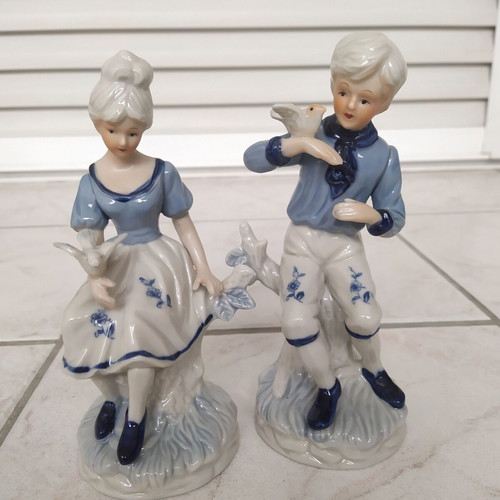 Vintage decorative figurines of boy and girl like new, 19 cm tall