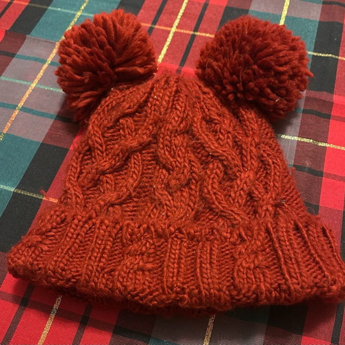 Knitted hat used, burgundy Zara with two pom-poms