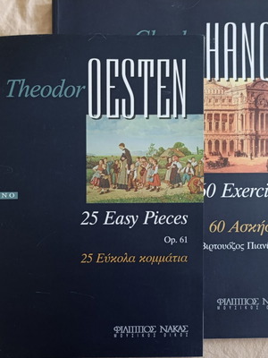 Piano exercise books like new, set of 2 with CD included