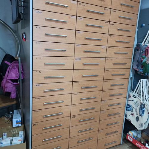 Pharmacy drawer unit like new with 3 columns and 33 drawers