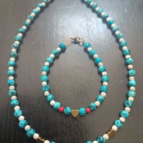 Handmade beaded necklace with gold heart detail