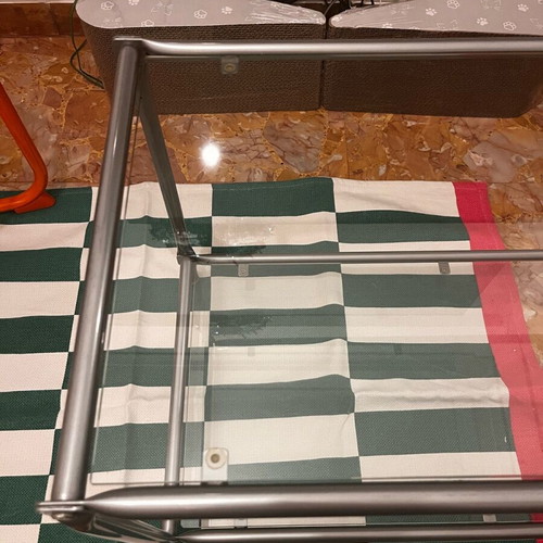 Coffee table used with metal silver frame and glass surface