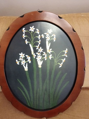 Vintage painting with embroidered flowers and carved frame.