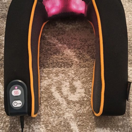 Neck massager used with adjustable intensity and heat function