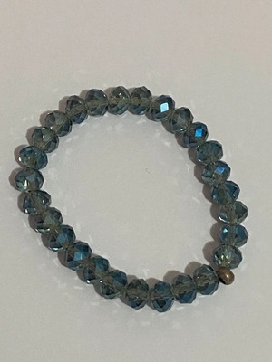 Bracelet with blue beads like new, elastic