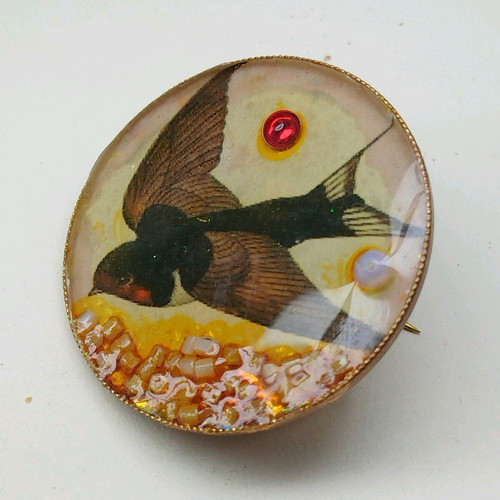 Swallow brooch new, copper and epoxy resin