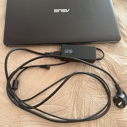 Asus VivoBook laptop with new charger, 15-inch, Intel Celeron, 4GB RAM