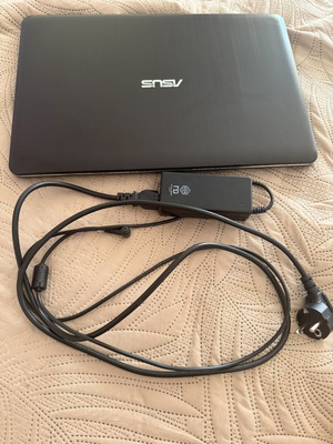 Asus VivoBook laptop with new charger, 15-inch, Intel Celeron, 4GB RAM
