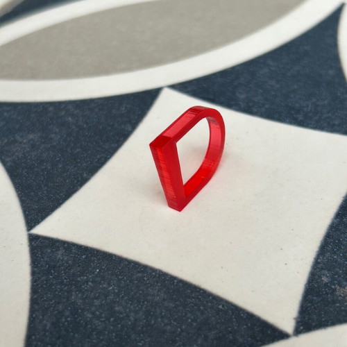 Plexiglass ring like new with red transparent color and unique design