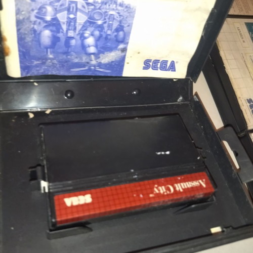 Master System games 9 with 10 cases, unknown condition