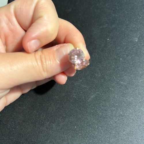 Earrings with pink rhinestones used