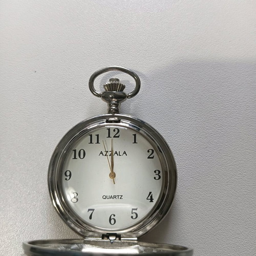 Collectible pocket watch like new in silver and gold tones