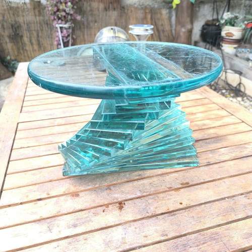 Round coffee table used with glass spiral base