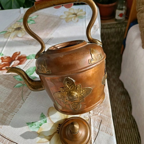 French teapot used with vintage brass decoration