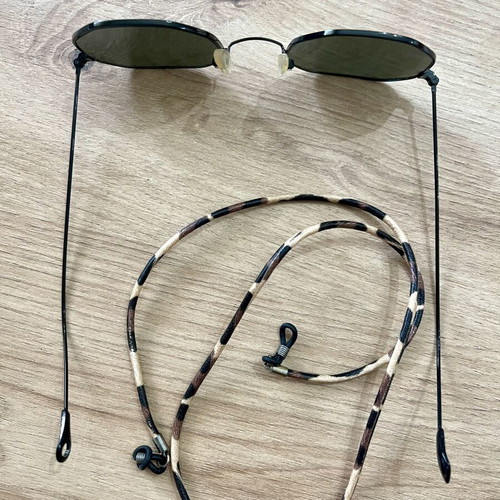 Polygonal statement sunglasses with asymmetrical design and strap