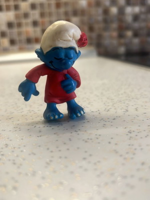 Schleich Smurf figure used in bed