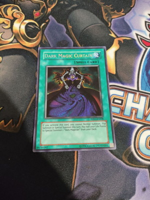 Yu-Gi-Oh card Dark Magic Curtain used, damaged condition