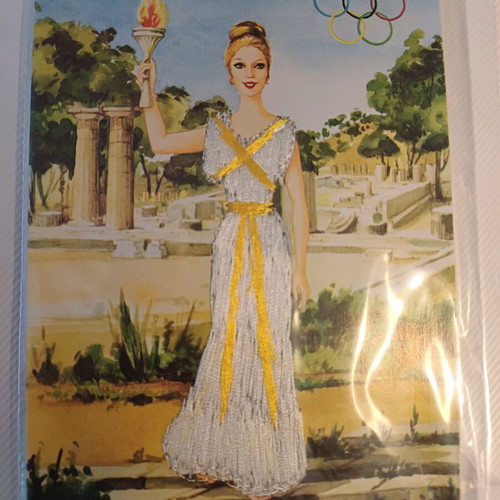 Postcard from the 60s like new with embroidered dress