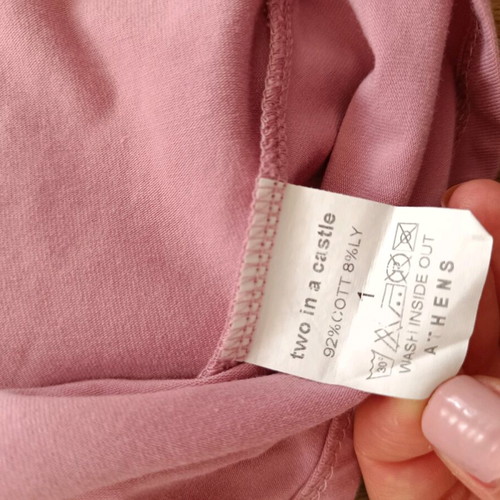Pink dress with bow on back two in a castle 12-18 months like new