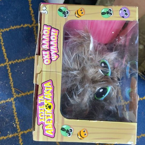 Save The Stray Puppies plush dog with opened packaging