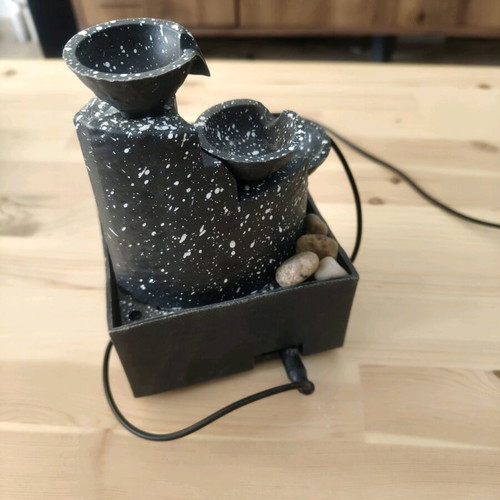 Mini fountain used, battery and electric powered