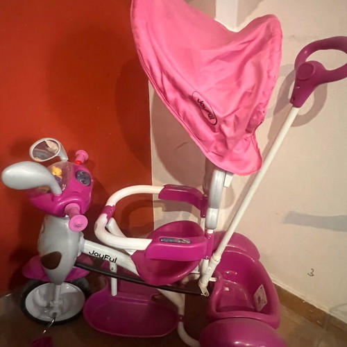Tricycle like new with canopy, footrest and safety bar