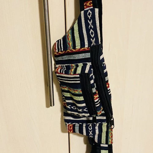 Waist bag like new, woven style, black and multicolor