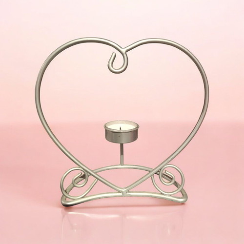 Decorative silver iron heart candle holder like new