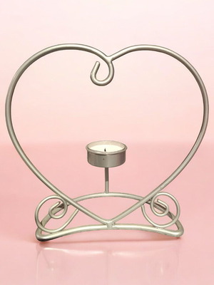 Decorative silver iron heart candle holder like new