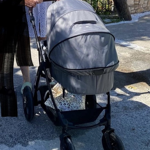 Kinderkraft 3-in-1 grey stroller with car seat