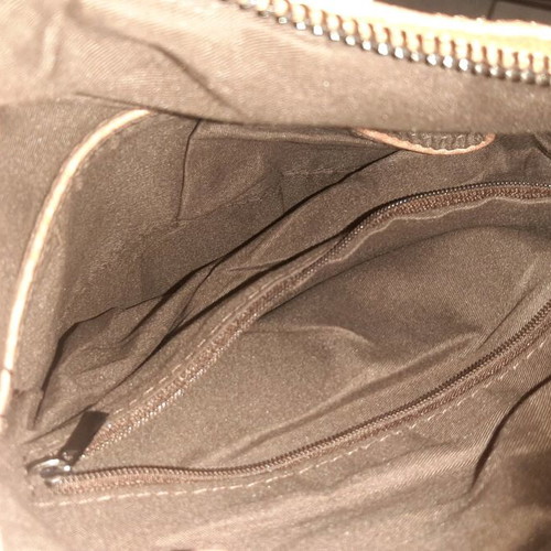 Backpack used with minor scratch on side