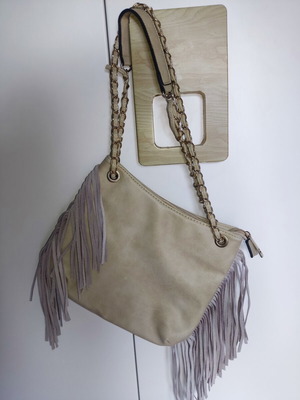 Shoulder bag with fringes and gold details, like new, beige suede leather