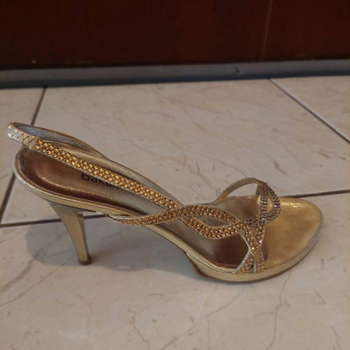 Gold sandals used, size 38