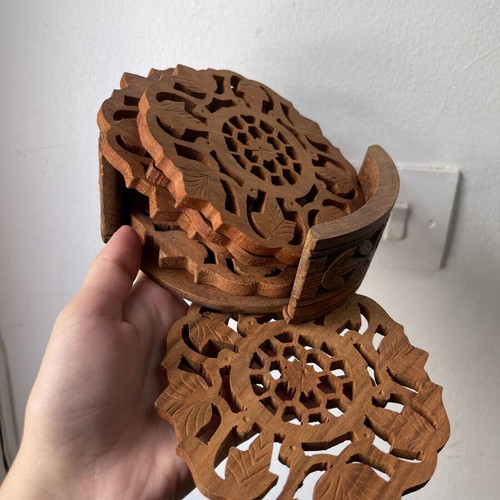 Vintage wooden coaster set 6 pieces with carved design and holder