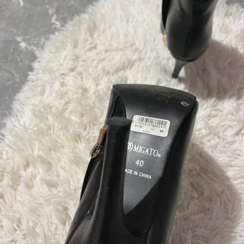 Migato black boots with 10 cm heel like new