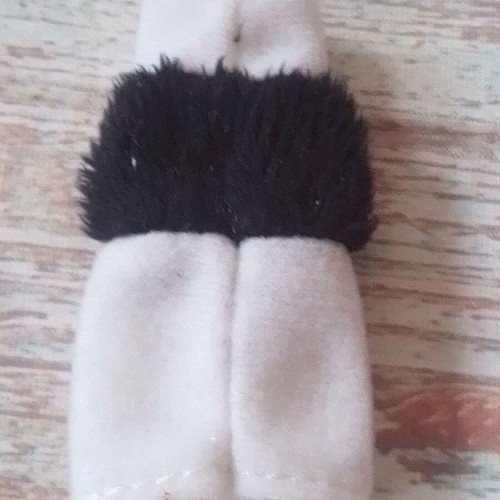 Plush finger puppet nurse used for puppet theater