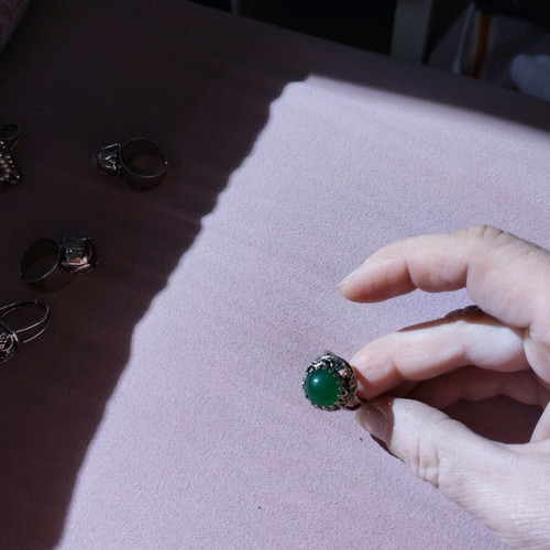 Vintage costume ring with green stone new, silver color