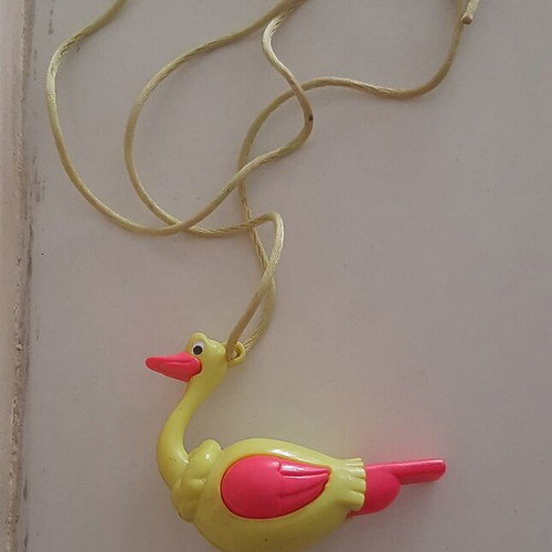 '90s Hanging Duck Whistle like new, yellow and pink