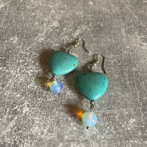 Dangling earrings with blue hearts like new