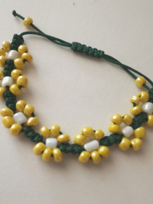 Handmade beaded bracelet with flower design, new, green and yellow