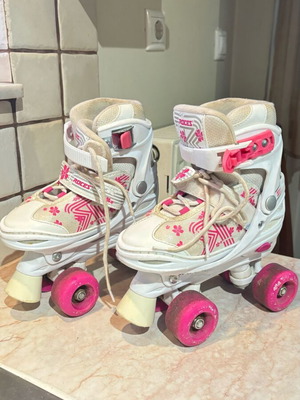 Roces roller skates used with 4 wheels for girls, adjustable size 30-33