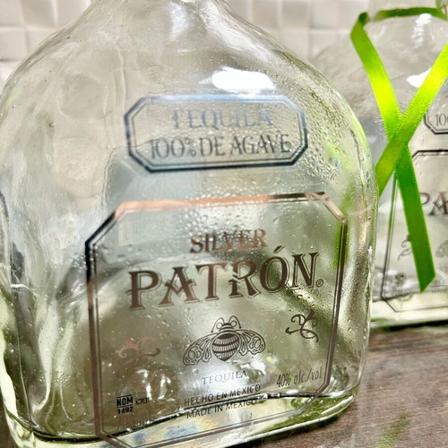 Patron champagne bucket like new with 4 empty silver bottles