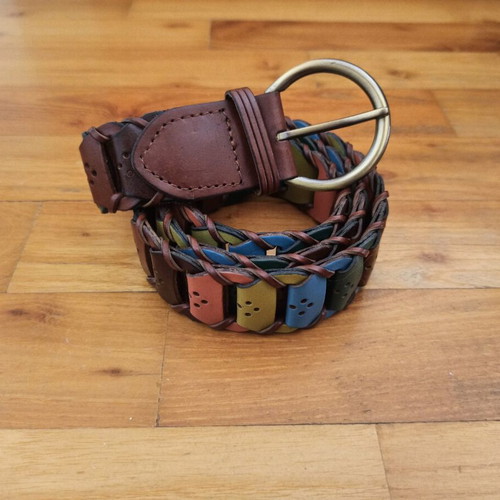 Colorful woven belt in warm shades made of faux leather, like new