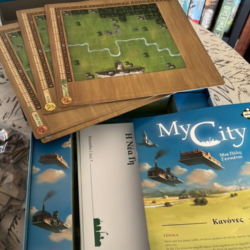 My City board game like new with some tokens marked