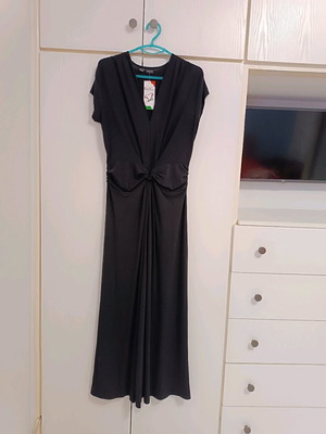 Black one-piece jumpsuit new, size M